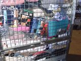 a large metal cart with many items in it