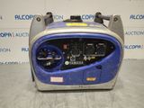 a blue and silver portable generator sitting on top of a table