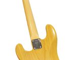 a close up of a yellow electric guitar on a white background