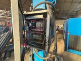 a machine that is sitting inside of a building