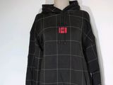 black and white plaid hoodie with red number 11 on the front
