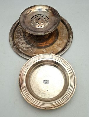 silver plate with a silver lid and a silver plate with a silver lid