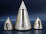 three silver vases sitting on top of a table next to each other