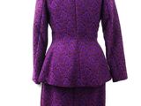 a close up of a purple suit on a mannequin mannequin