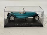 a blue model of a car in a clear case
