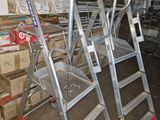 a ladder that is leaning against a wall in a warehouse