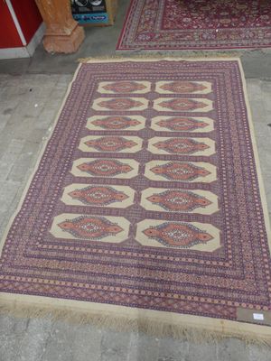 two rugs are laid out on the floor in a room