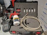 a picture of a tool kit with a hose and other tools