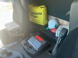 a picture of a car with a bunch of items in it