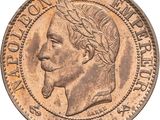 a close up of a coin with a man ' s face on it