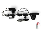 an image of a group of cameras sitting on top of a white surface