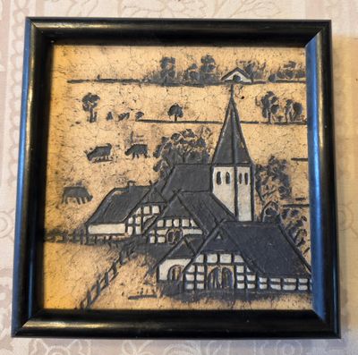une image d'un tableau sur le mur d'une maison