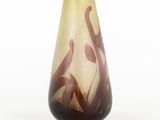 an image of a glass vase with a flower design on it