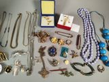 many different types of jewelry on the table