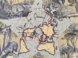 une vieille carte du monde sur laquelle figurent des animaux