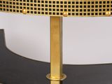 a black and gold console table with a black top