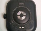 a close up of a small black camera on a table
