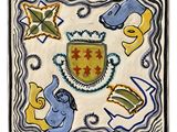 une image représentant un carreau décoratif orné d'un blason