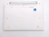 a white laptop with a blue sticker on it