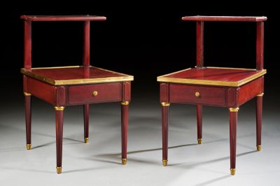 pair of red and gold side tables with drawers on each side