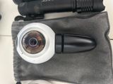 a camera that is sitting on top of a bag