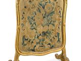 une image représentant un cadre doré orné d'un motif floral