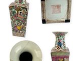 quatre vases différents et un cadre photo sur fond blanc