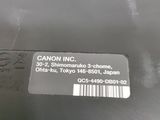 the back end of a car with a sticker that says canon inc