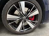 a close up of a tire on a blue car