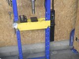 a blue and yellow machine that is in a room