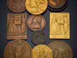 a close up of a bunch of coins on a table