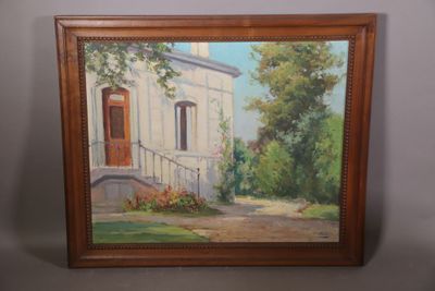 un tableau représentant une maison avec une porte rouge dans un cadre en bois
