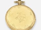 an image of a gold pocket watch on a white background