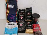 many different types of coffee bags on the table