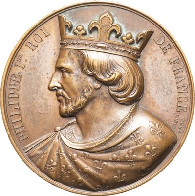 une image représentant une médaille de bronze sur laquelle figure un homme coiffé d'une couronne