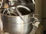 an image of a kitchen with a mixer on the counter