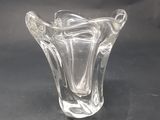 an image of a clear glass vase sitting on top of a table