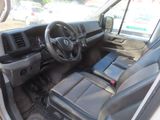 a view of the inside of a truck with the driver ' s seat up