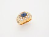 an oval sapphire and diamond ring