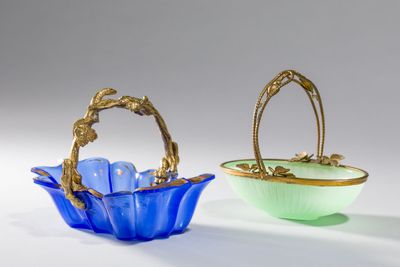pair of blue and green glass baskets with gold handles