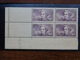 a stamp with a picture of a man and a woman on it