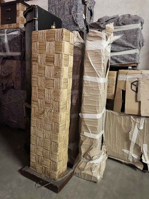 a stack of boxes and boxes in a warehouse