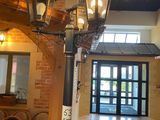 a light that is hanging from the ceiling in a restaurant