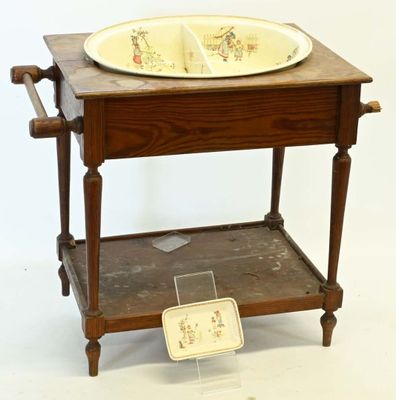 a small wooden table with a bowl on top of it