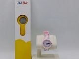 a watch sitting on top of a stand next to a box