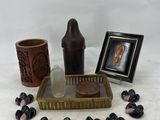 a picture of a picture of a vase, a picture of a woman, and some other items