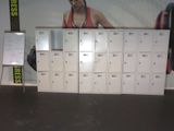 a wall of lockers with a picture of a woman on it