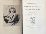 un livre ouvert avec le dessin d'une femme en robe