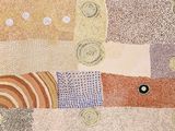 un gros plan sur un morceau de tissu orné de cercles