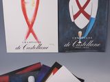 several posters of various types of clothing are displayed on a table